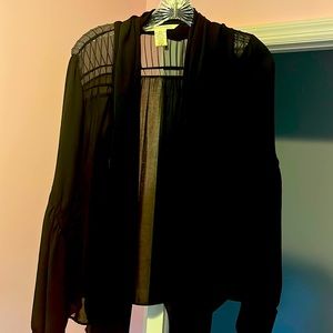 Diane von furstenberg sheer black blouse. Size 4. Tie neck.